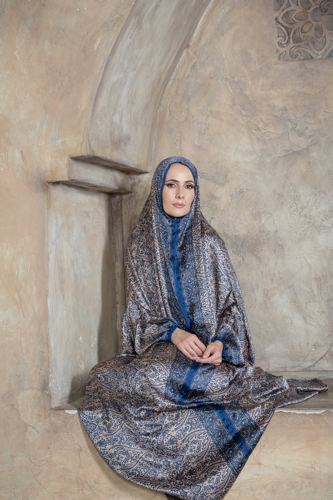 Woman wearing a sapphire blue one-piece prayer dress | Serenity Scarves